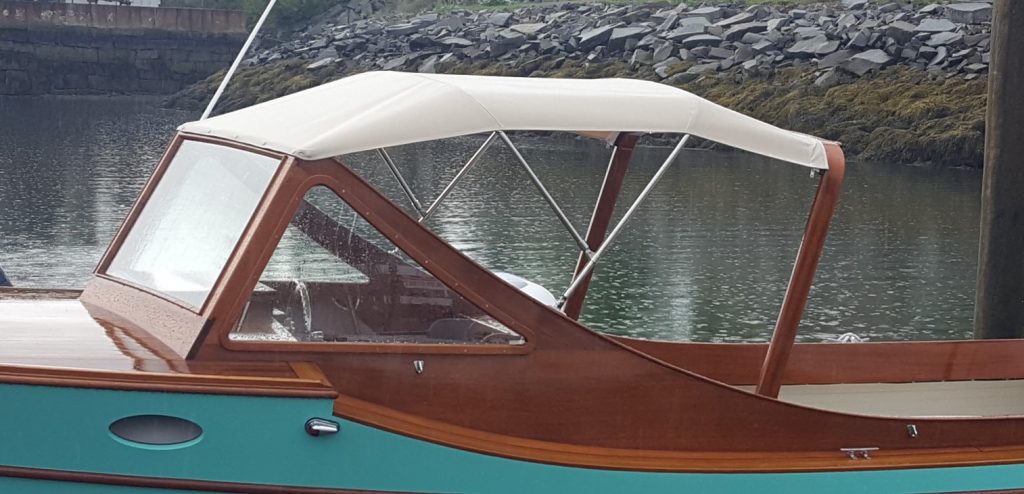 Picnic boat with bimini top