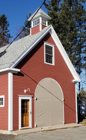 Large arched barn door protected for the Winter.