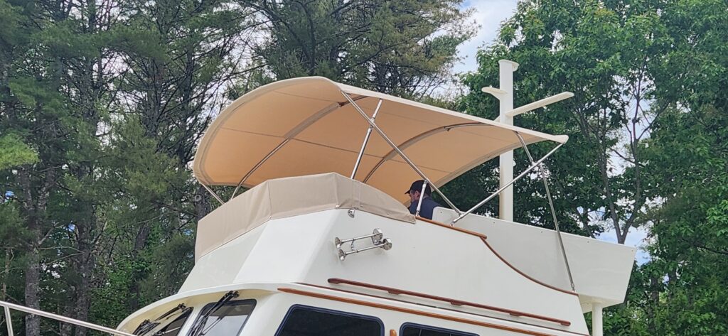 Tall bimini on fly bridge from below.