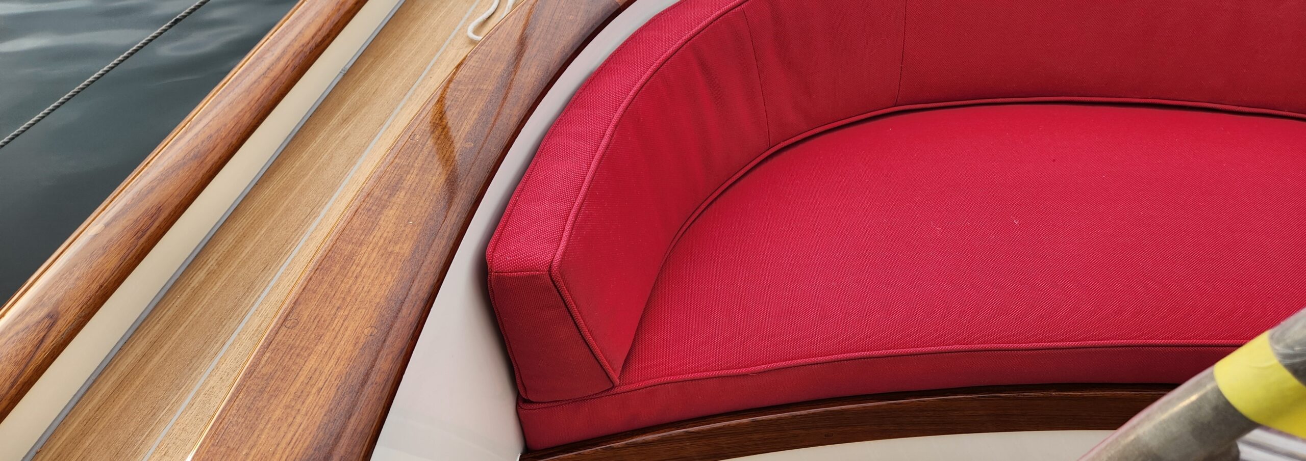 Red curved helm bench